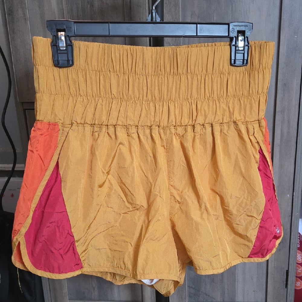 Dynamic Yellow and Orange Athletic Shorts for Active Performance